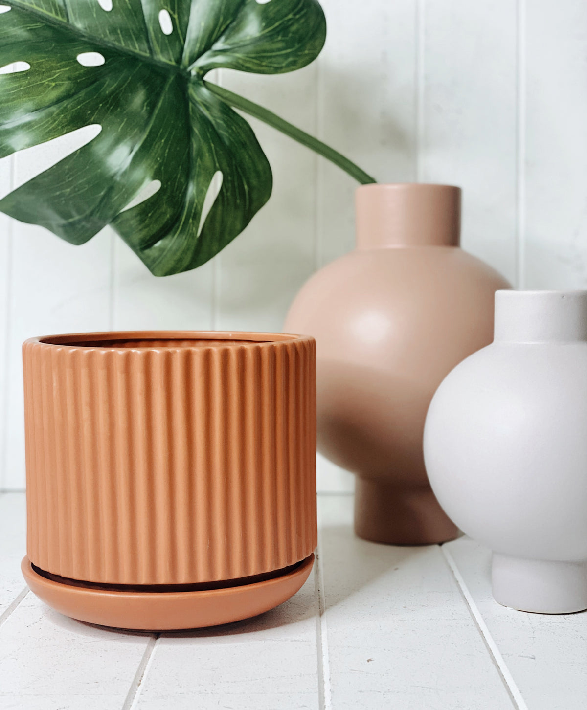 Be the best plant parent you can be with our Amana planter. Made from terracotta with a unique rib texture, our planter can go out on your verandah, your windowsill or even on the corner of your work desk. 19x18cm.| Bliss Gifts &amp; Homewares | Unit 8, 259 Princes Hwy Ulladulla | South Coast NSW | Online Retail Gift &amp; Homeware Shopping | 0427795959, 44541523