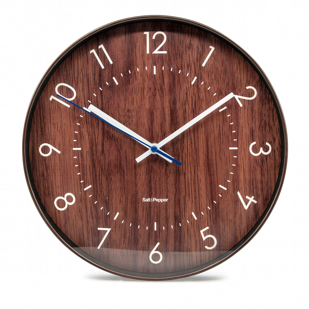 The 31cm Bailey Clock from Salt and Pepper, features a dark brown timber look face with white and blue hands and easy to read numbers, perfect for a kitchen or home office | Silent sweep motion | Shop online or in-store | AfterPay available | Australia wide Shipping | Unit 8, 259 Princes Hwy Ulladulla | South Coast NSW | 0427795959, 44541523