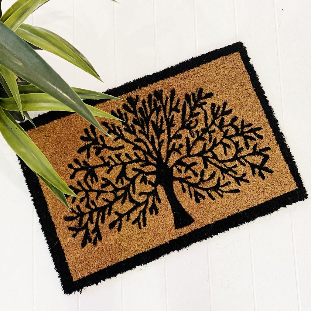 Our Black Frame Tree Of Life Door Mat is the perfect way to create a relaxed feel to your home before your guests even step foot inside with its welcoming tree design - 40x60 - Natural background with black text - Made from Natural coir fibres - PVC backing | Bliss Gifts &amp; Homewares | Unit 8, 259 Princes Hwy Ulladulla | South Coast NSW | Online Retail Gift &amp; Homeware Shopping | 0427795959, 44541523