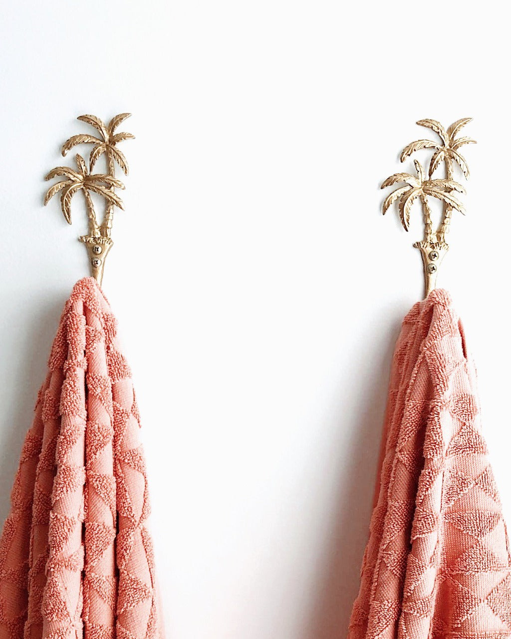 Our Islander Palm Tree Wall Hook has two brass swaying palm trees and a single hook. This little beauty is great to hang your keys, hat or towels. Our Islander Palm Tree Wall Hook comes with screws ready to hang. Add a touch of the tropics to your decor.| Bliss Gifts &amp; Homewares | Unit 8, 259 Princes Hwy Ulladulla | South Coast NSW | Online Retail Gift &amp; Homeware Shopping | 0427795959, 44541523