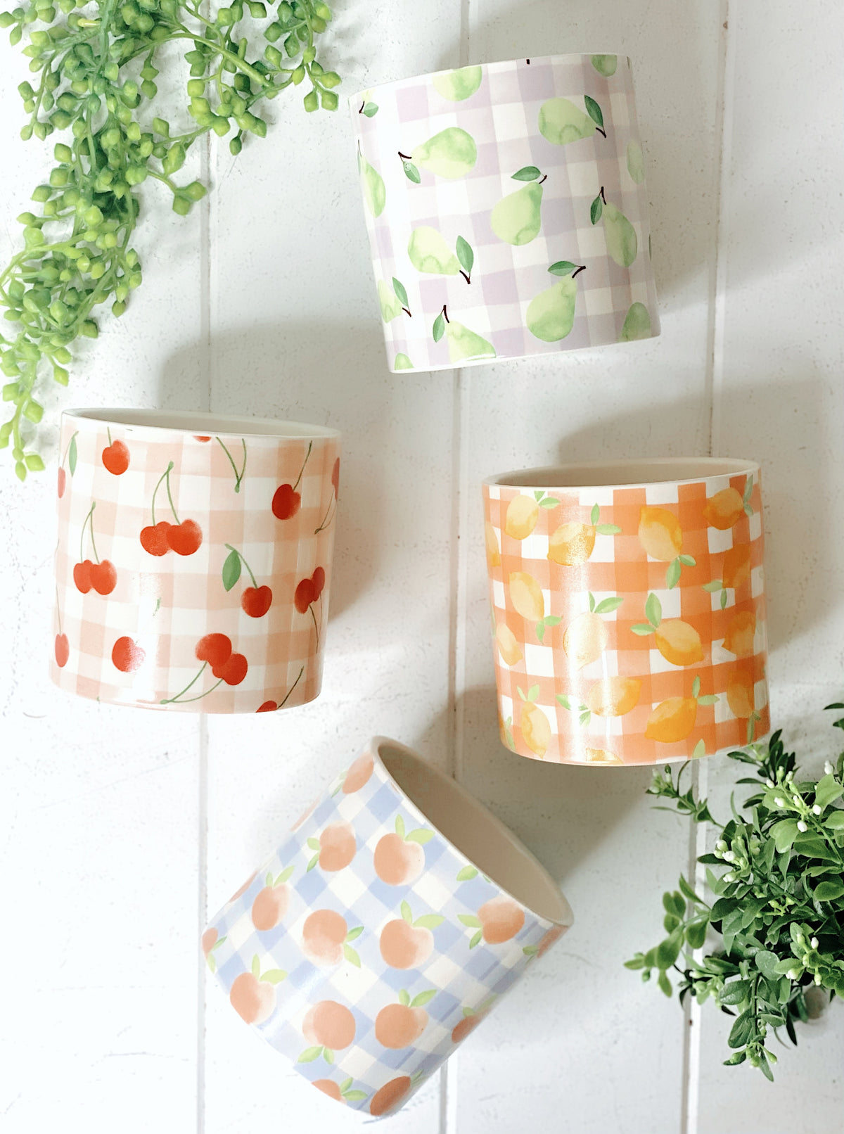 Our gorgeous Tutti Frutti Ceramic Pots create a unique style with bold colours featuring gingham patterns and summer fruits. These pots are perfect to help transform your indoor or outdoor garden with beautiful bright colours. Available in 4 styles. 10x10cm. | Bliss Gifts &amp; Homewares | Unit 8, 259 Princes Hwy Ulladulla | South Coast NSW | Online Retail Gift &amp; Homeware Shopping | 0427795959, 44541523