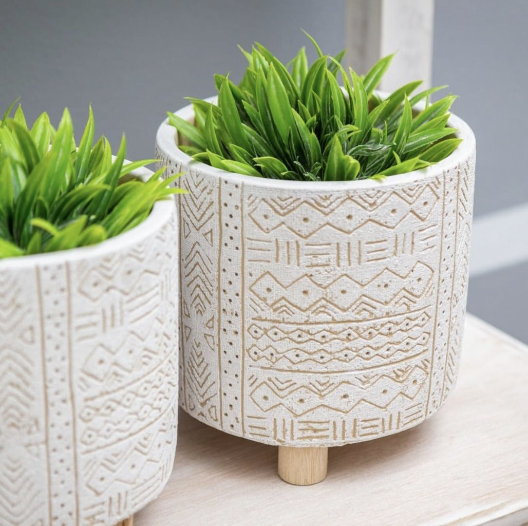 Add style to your plants and home with our White Tribal Pots. The neutral tones will compliment any home, and the textured finish will add a modern touch. Drainage hole, suitable for indoor and outdoor use. 14x14x14cm. Terracotta and timber legs.| Bliss Gifts &amp; Homewares | Unit 8, 259 Princes Hwy Ulladulla | South Coast NSW | Online Retail Gift &amp; Homeware Shopping | 0427795959, 44541523