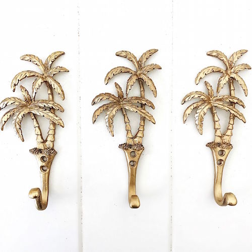 Our Islander Palm Tree Wall Hook has two brass swaying palm trees and a single hook. This little beauty is great to hang your keys, hat or towels. Our Islander Palm Tree Wall Hook comes with screws ready to hang. Add a touch of the tropics to your decor.| Bliss Gifts &amp; Homewares | Unit 8, 259 Princes Hwy Ulladulla | South Coast NSW | Online Retail Gift &amp; Homeware Shopping | 0427795959, 44541523