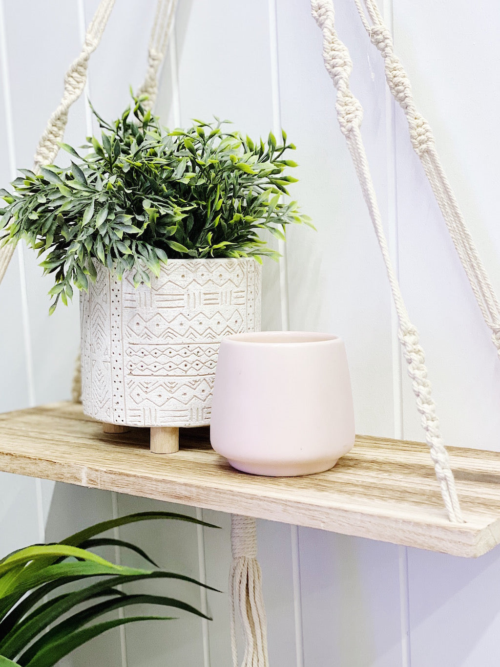 Add style to your plants and home with our White Tribal Pots. The neutral tones will compliment any home, and the textured finish will add a modern touch. Drainage hole, suitable for indoor and outdoor use. 14x14x14cm. Terracotta and timber legs.| Bliss Gifts &amp; Homewares | Unit 8, 259 Princes Hwy Ulladulla | South Coast NSW | Online Retail Gift &amp; Homeware Shopping | 0427795959, 44541523