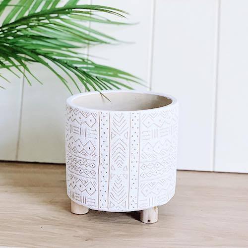 Add style to your plants and home with our White Tribal Pots. The neutral tones will compliment any home, and the textured finish will add a modern touch. Drainage hole, suitable for indoor and outdoor use. 14x14x14cm. Terracotta and timber legs.| Bliss Gifts &amp; Homewares | Unit 8, 259 Princes Hwy Ulladulla | South Coast NSW | Online Retail Gift &amp; Homeware Shopping | 0427795959, 44541523